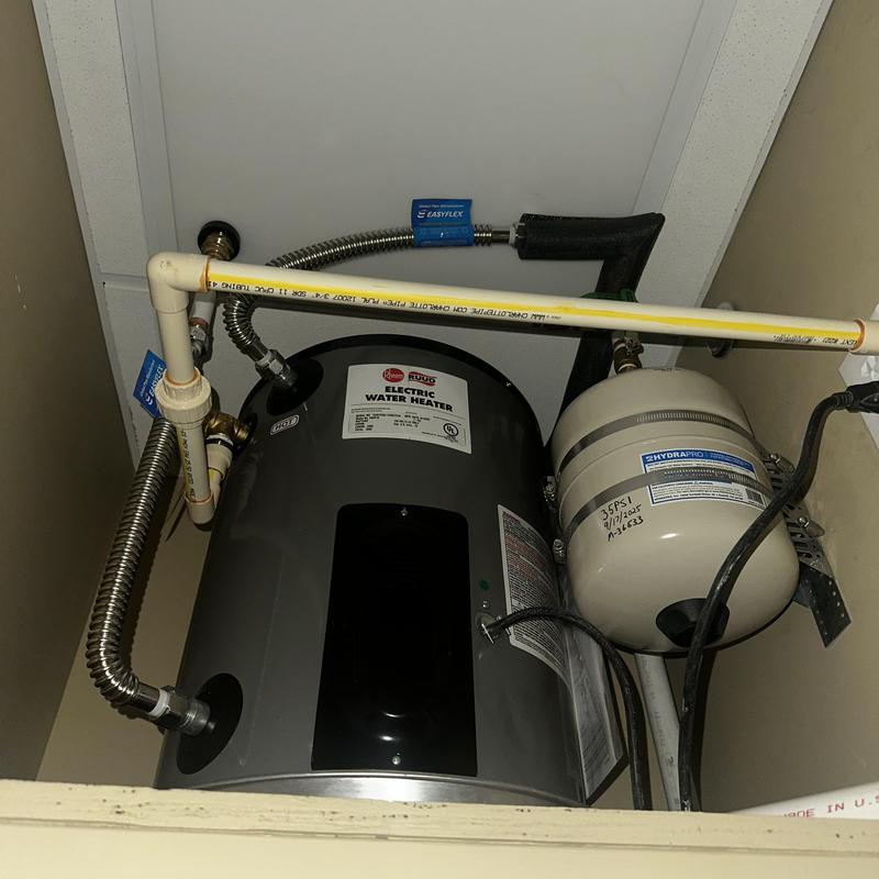 Electric water heater installation with pressure tank
