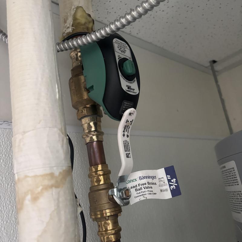 Leak breaker valve on commercial water heater piping