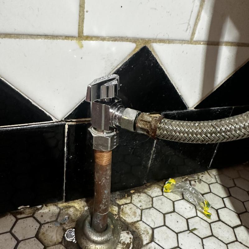 Angle stop valve with braided hose connection