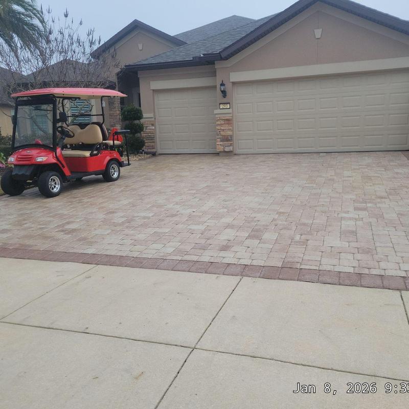 Owens Corning roof with brick paver driveway and golf cart Owens Corning roof with brick paver driveway and golf cart