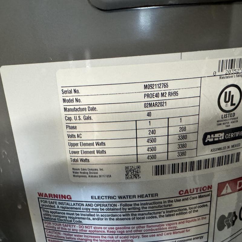 Electric water heater label with specs and warnings