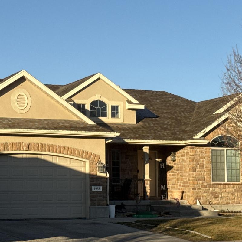 Asphalt shingle roof on residential home in West Valley City Asphalt shingle roof on residential home in West Valley City