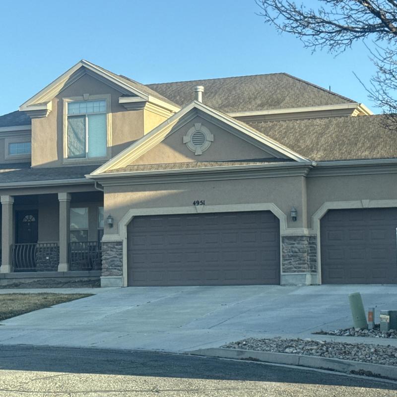 Asphalt shingle roof on suburban home in West Valley City Asphalt shingle roof on suburban home in West Valley City