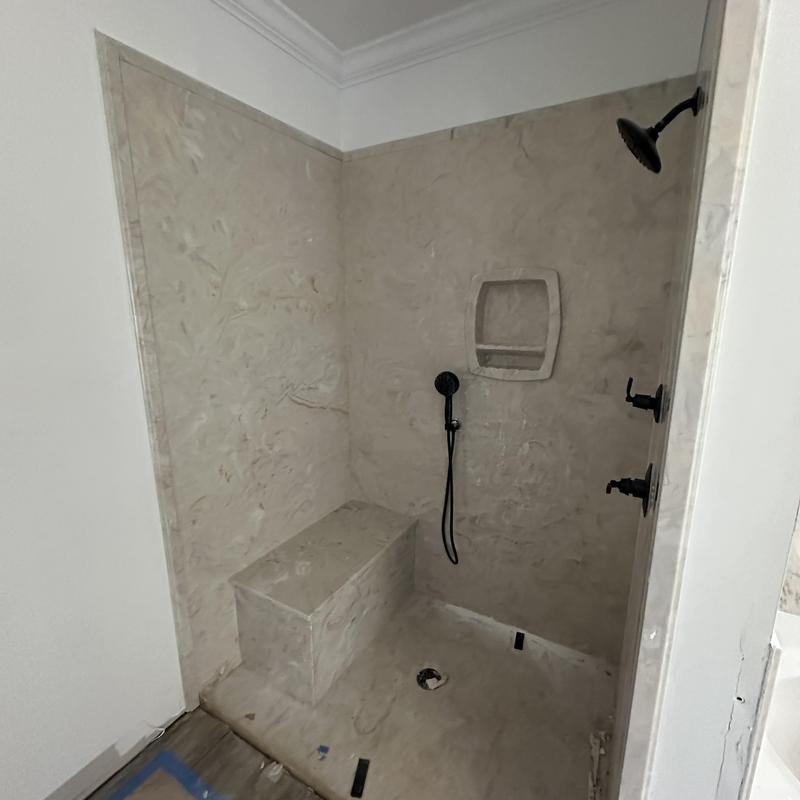 Groutless custom shower unit with built-in bench Groutless custom shower unit with built-in bench