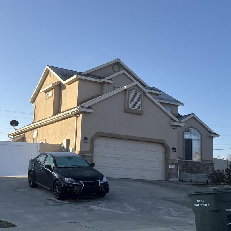 Asphalt shingle roof on two-story home in West Valley City Asphalt shingle roof on two-story home in West Valley City