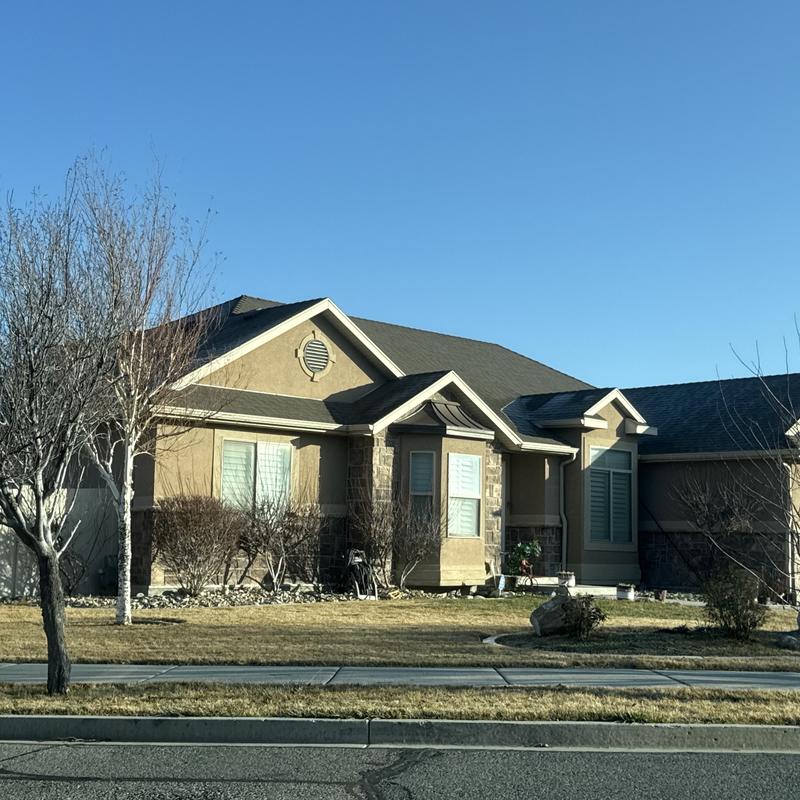Asphalt shingle roof on residential home in West Valley City Asphalt shingle roof on residential home in West Valley City