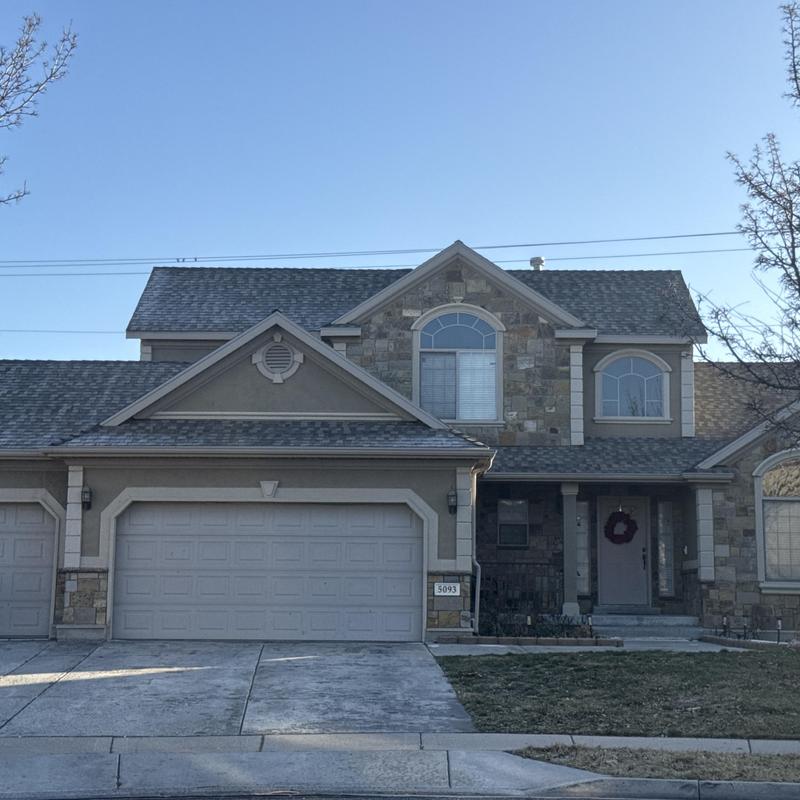 Asphalt shingle roof on suburban home in West Valley City Asphalt shingle roof on suburban home in West Valley City
