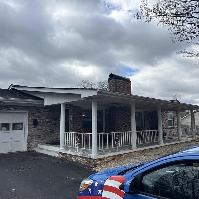 Residential roof replacement with covered porch in Blountville
