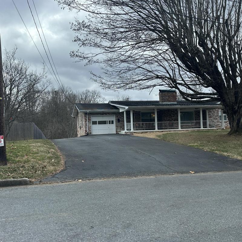 Asphalt shingle roof replacement on brick house