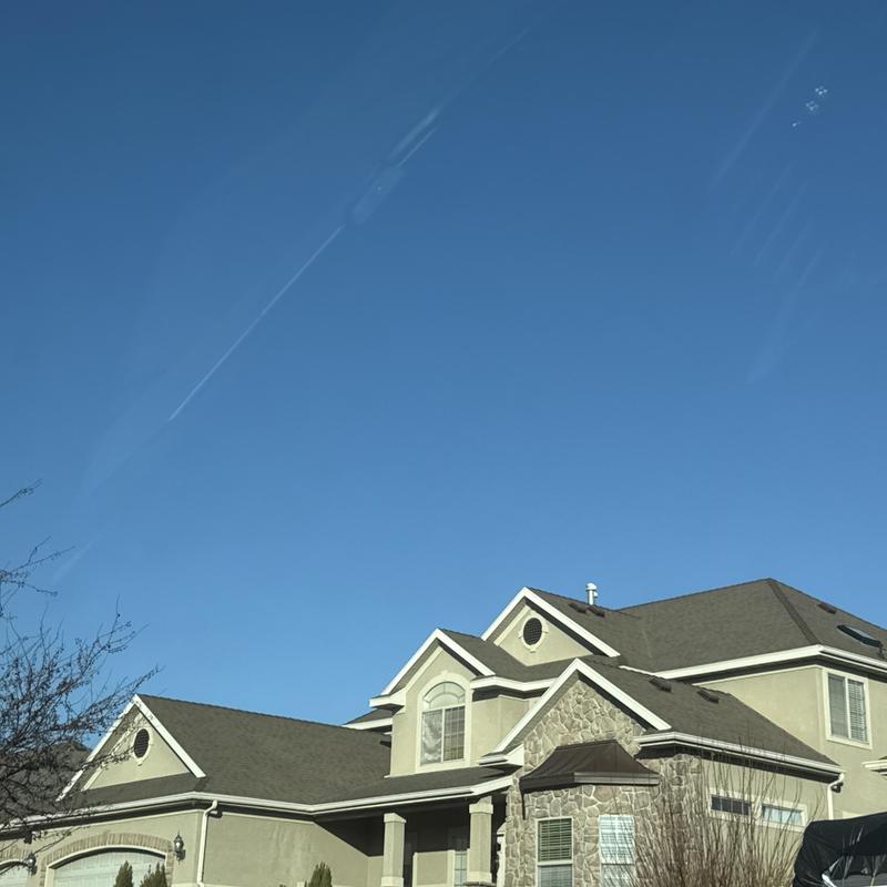 Asphalt shingle roof on large residential home Asphalt shingle roof on large residential home