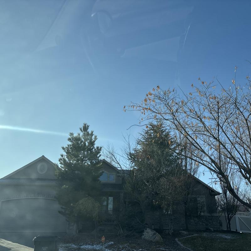 Asphalt shingle roof installation on residential home Asphalt shingle roof installation on residential home