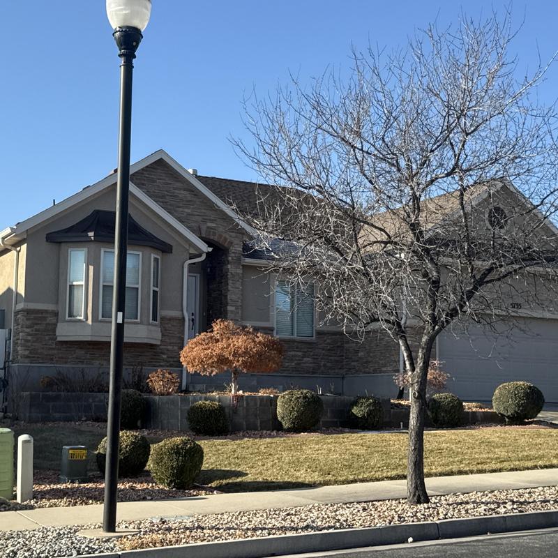 Asphalt shingle roof on residential home in Utah Asphalt shingle roof on residential home in Utah
