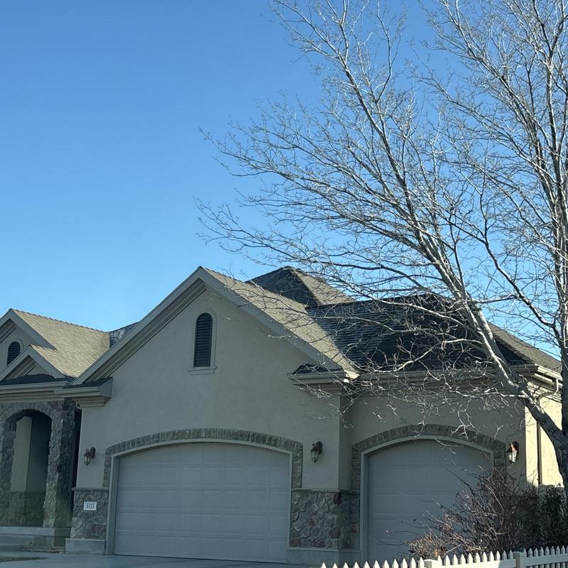 Asphalt shingle roof on residential home in West Valley City Asphalt shingle roof on residential home in West Valley City