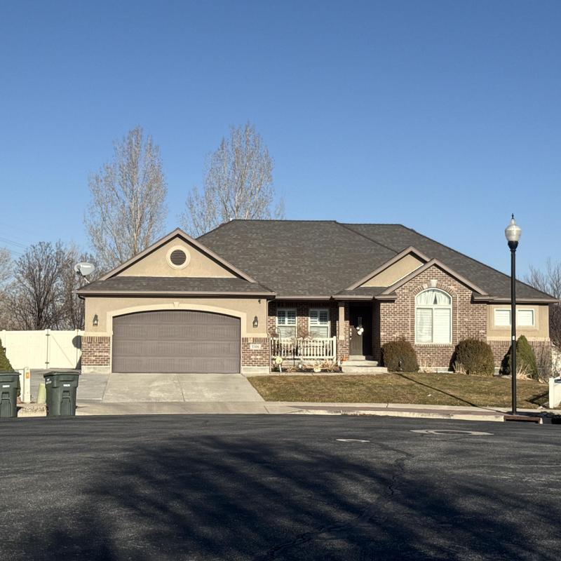 Asphalt shingle roof on suburban home Asphalt shingle roof on suburban home