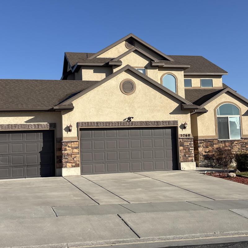 Asphalt shingle roof on two-story home in West Valley City Asphalt shingle roof on two-story home in West Valley City