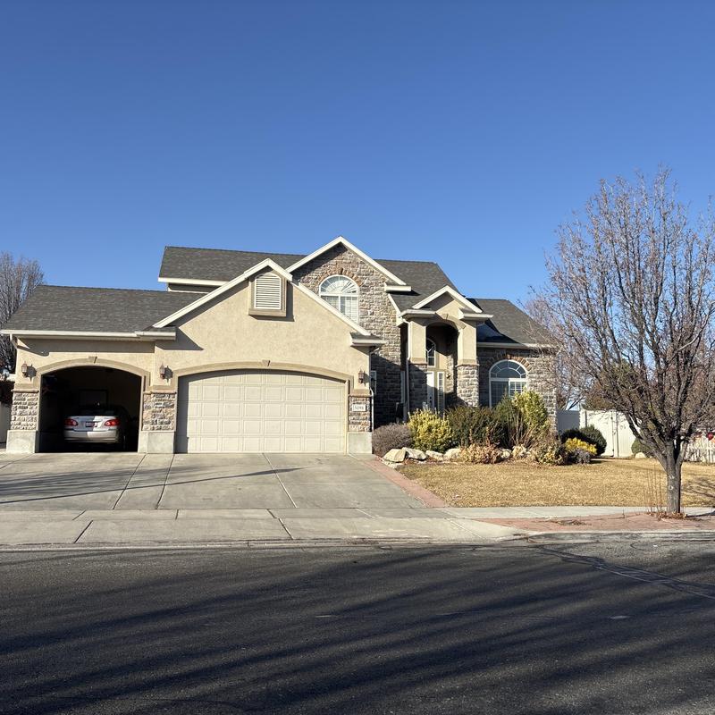 Asphalt shingle roof on residential home in West Valley City Asphalt shingle roof on residential home in West Valley City