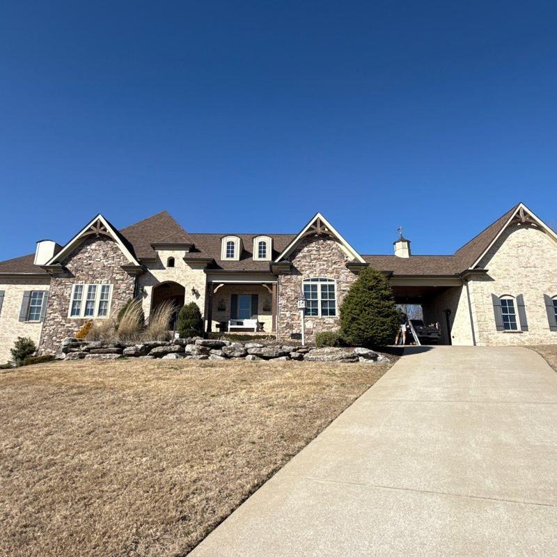 Roof shingles and ridge inspection on residential home