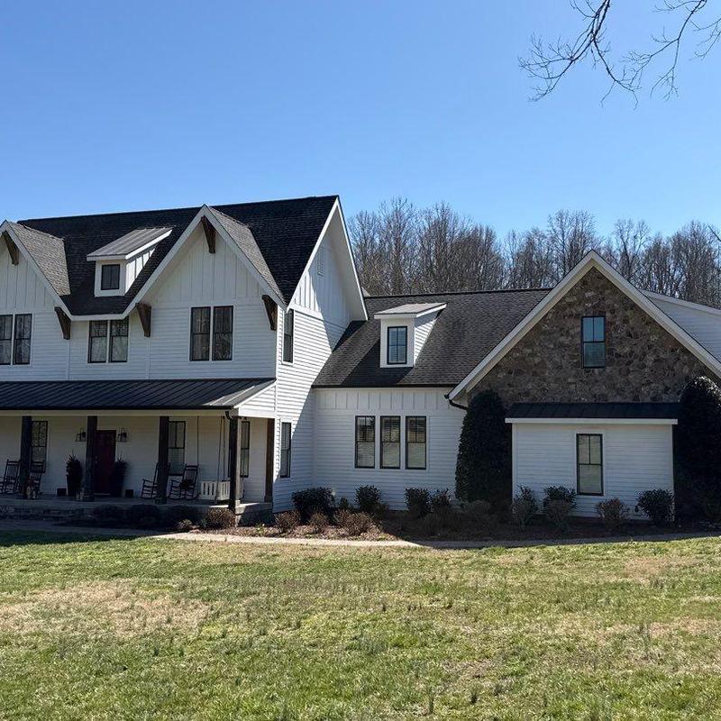 Asphalt shingle roof with hail damage in College Grove