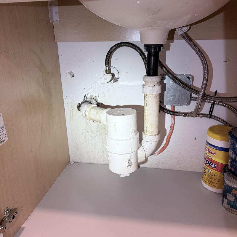 Double sink PVC drain pipes under cabinet clearance