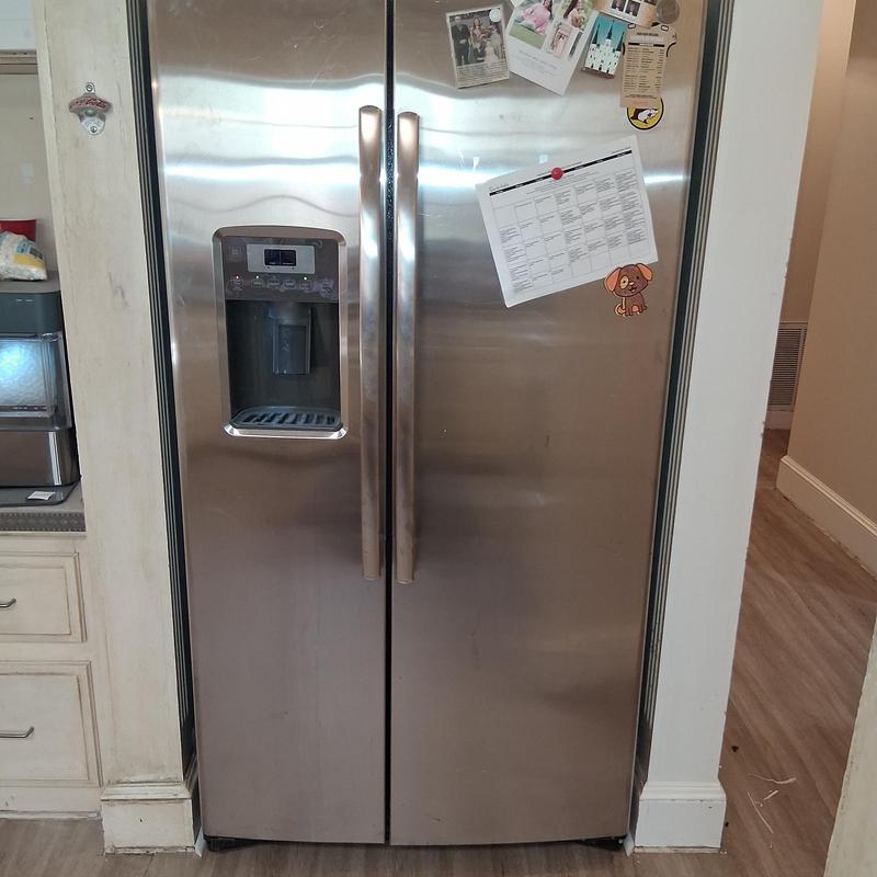 Refrigerator with ice maker and water line installation