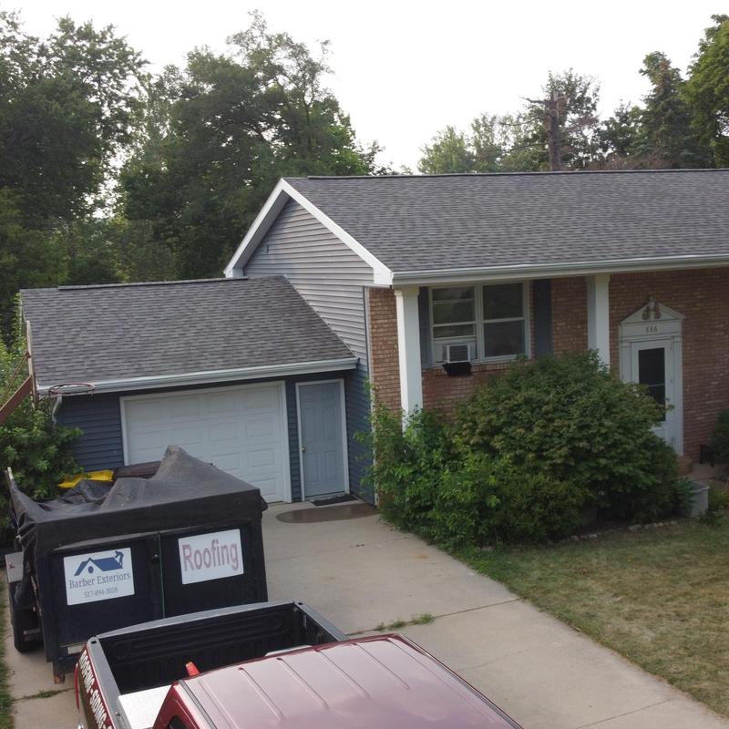 CertainTeed Landmark roof installation with dumpster nearby CertainTeed Landmark roof installation with dumpster nearby