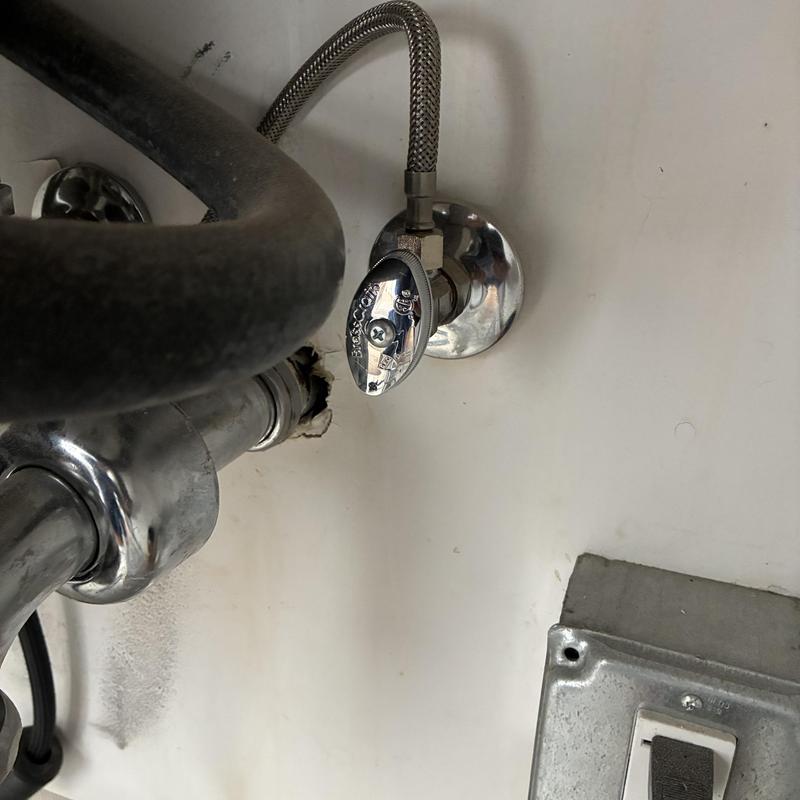 Pop-up basin sink drain assembly under sink