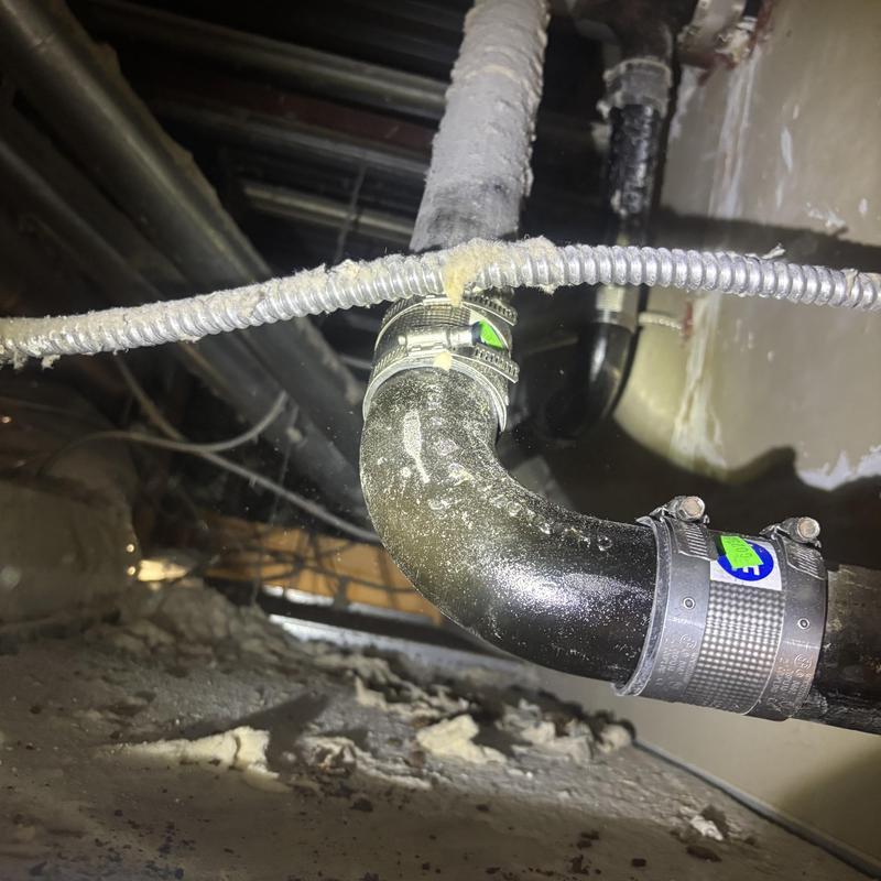 Cast iron 90-degree pipe elbow replacement under floor