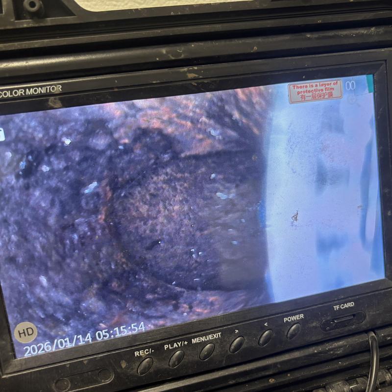 Mainline sewer pipe inspection on monitor screen