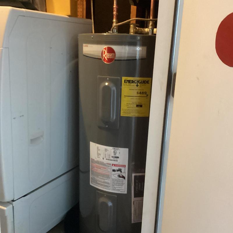 Electric water heater with copper pipe and insulation