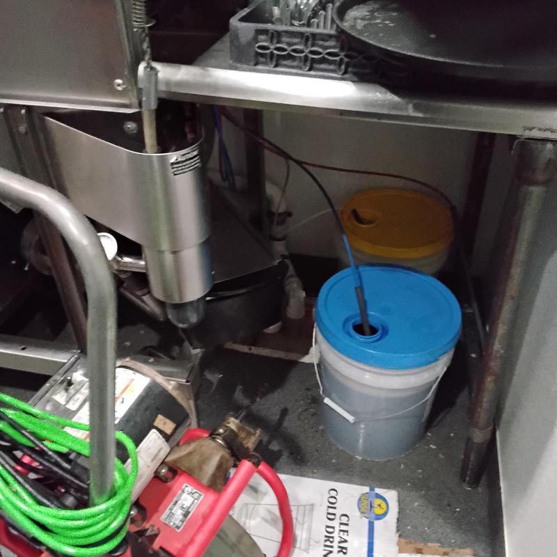 2-inch P-trap cable cleaning under sink with buckets