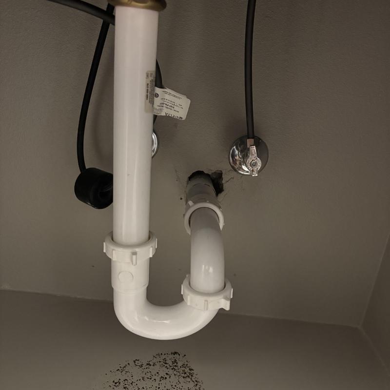 Tubular drain line under kitchen sink in Colleyville TX