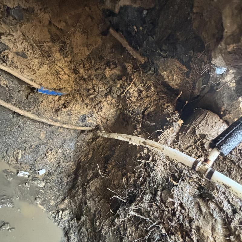 PEX-B piping and hose bib installation in soil trench