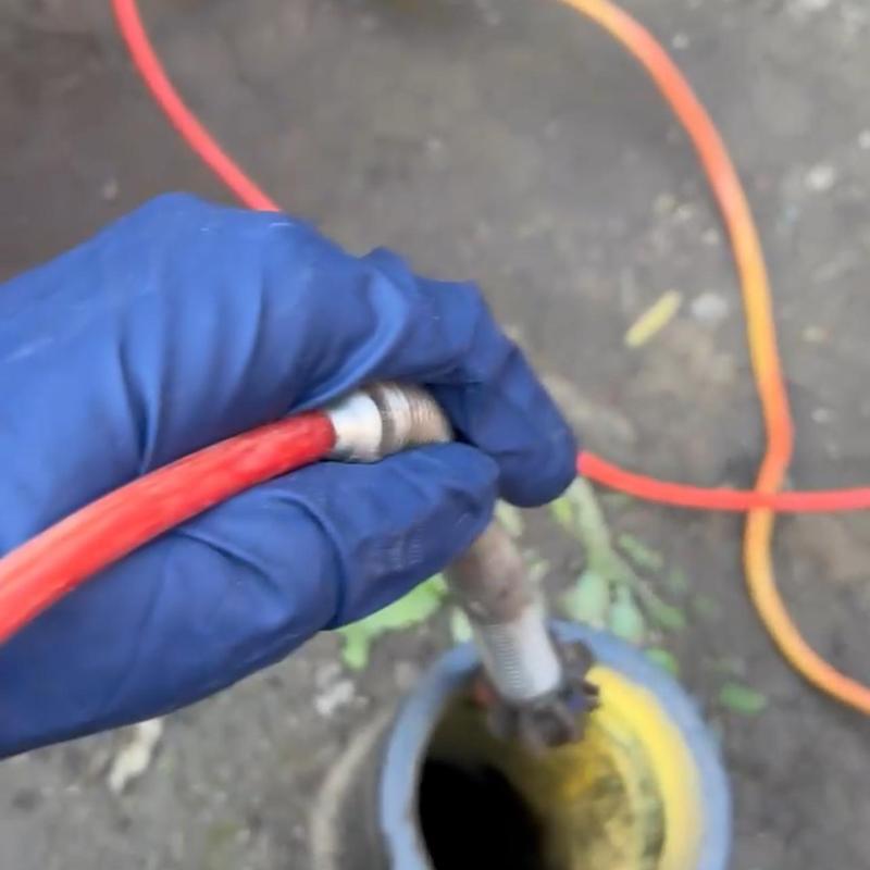 Drain camera insertion with root locator cable in ground