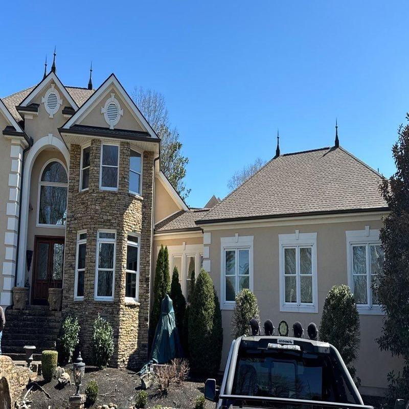 Roof shingles with hail damage inspection at residential home