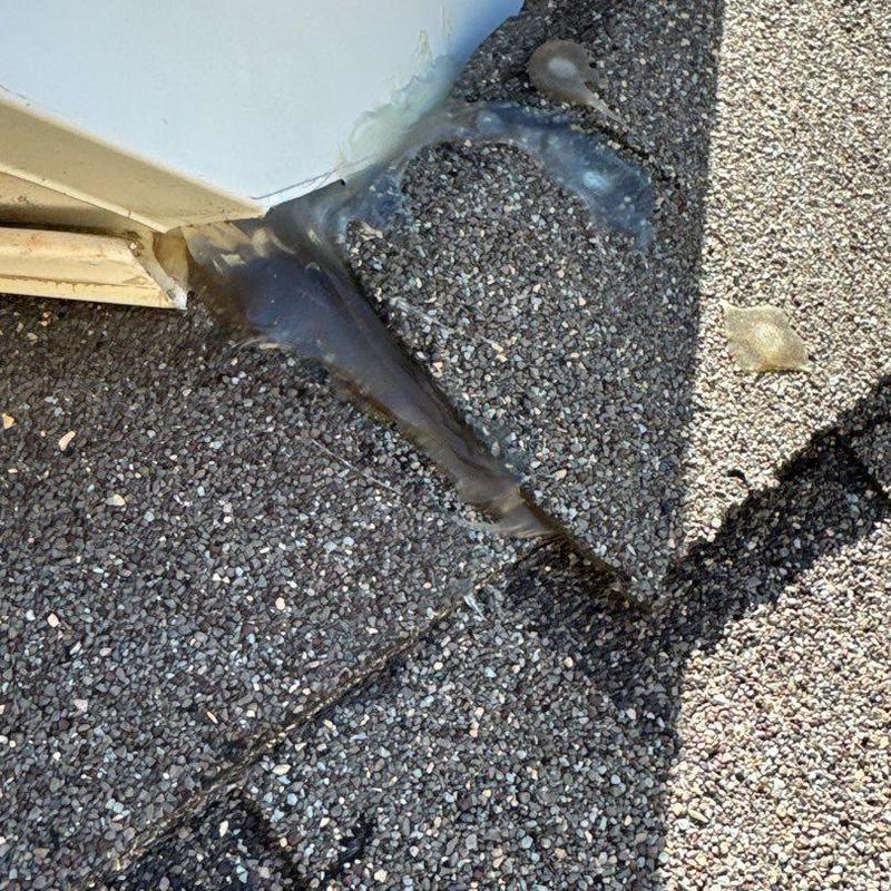 Roof flashing with sealant and gravel roofing granules