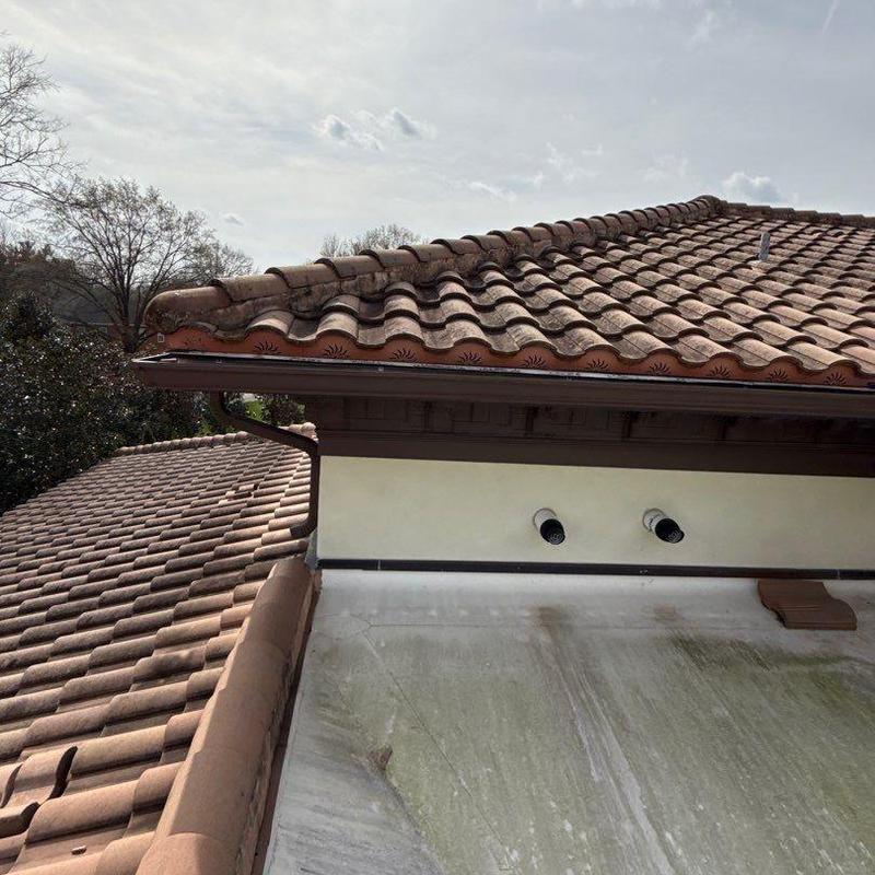 Clay tile roof with ridge and ventilation inspection