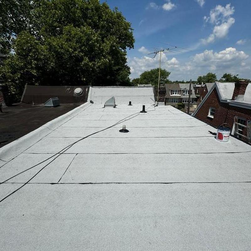 Firestone Modified Bitumen flat roof system installation Firestone Modified Bitumen flat roof system installation