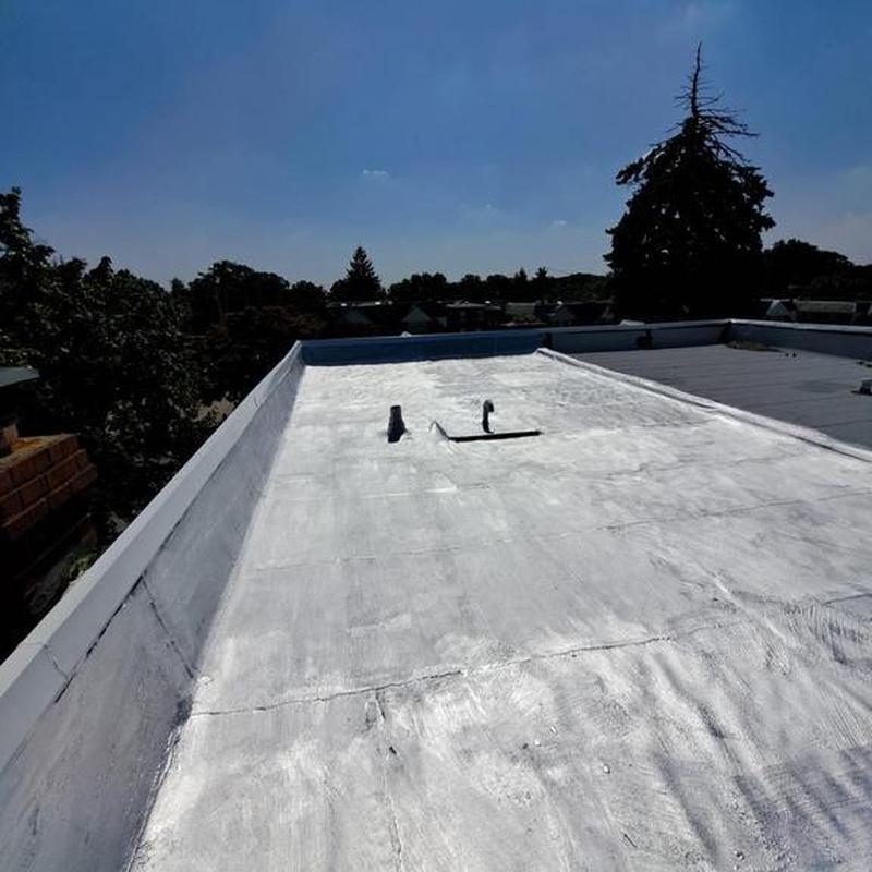 Flat roof aluminum silver coating and seam repair