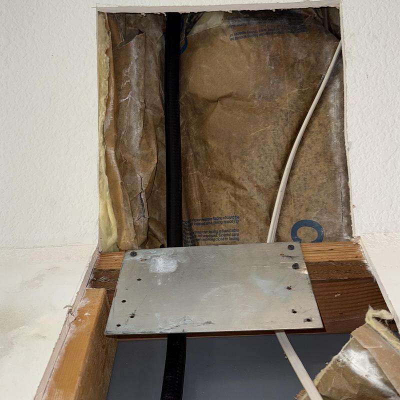 Gas line installation with wall insulation and wiring