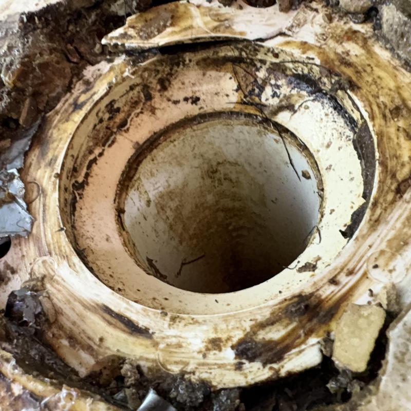 Toilet flange with corrosion and dirt buildup