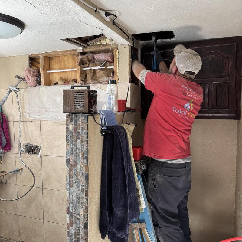 Hot water line reroute inside wall cavity