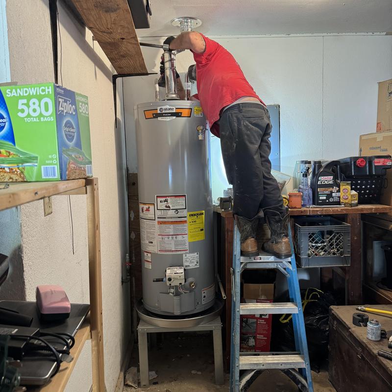 50-gallon gas water heater installation in garage
