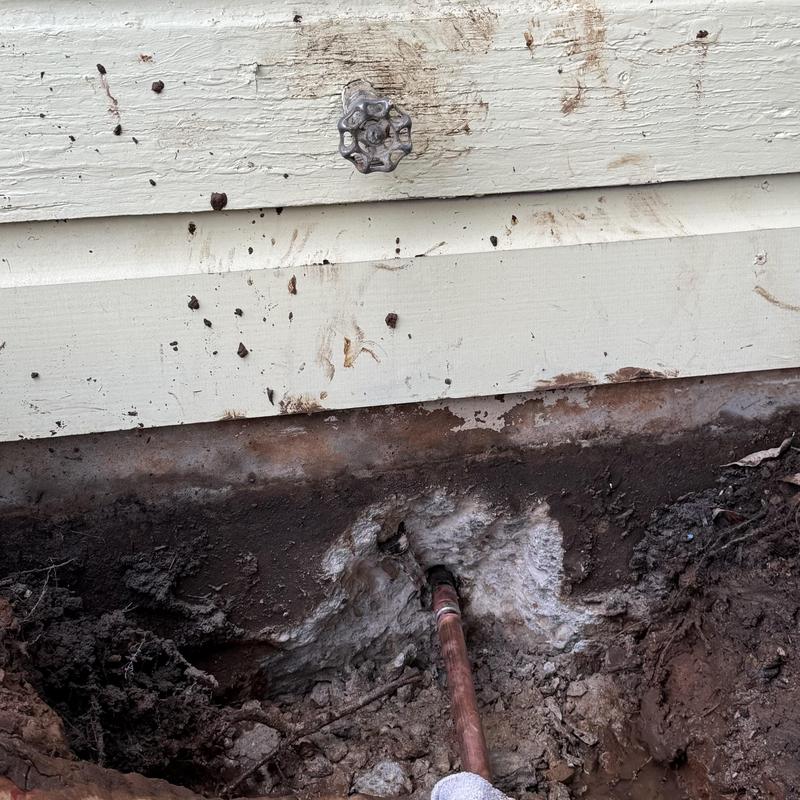 Copper water pipe leak repair at outdoor shut-off valve