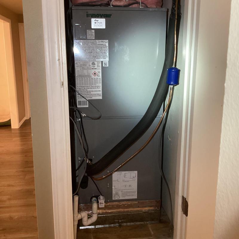 InnovaAir up flow air handler unit in utility closet