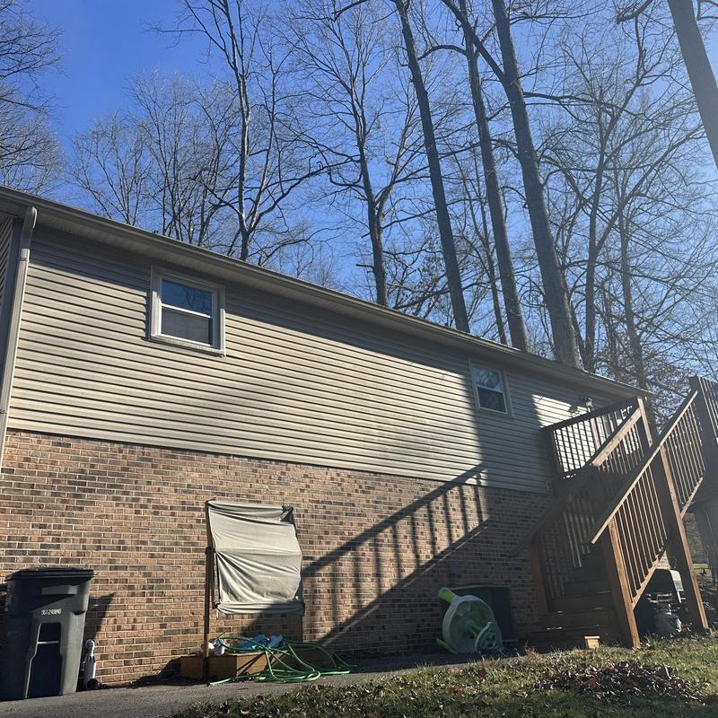 Vinyl siding installation on residential home exterior