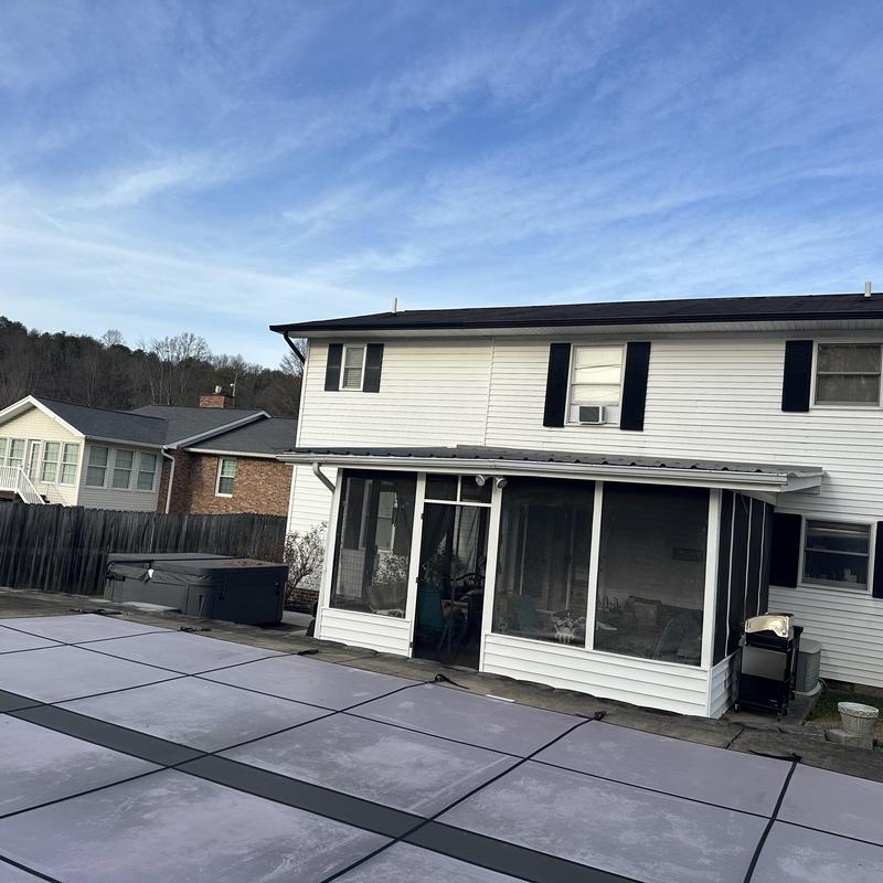 Black roof on classic two-story home
