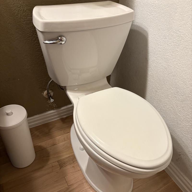 Commercial toilet replacement in bathroom corner