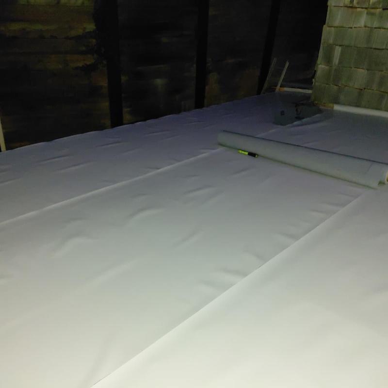 Roof membrane installation in Marysville attic space