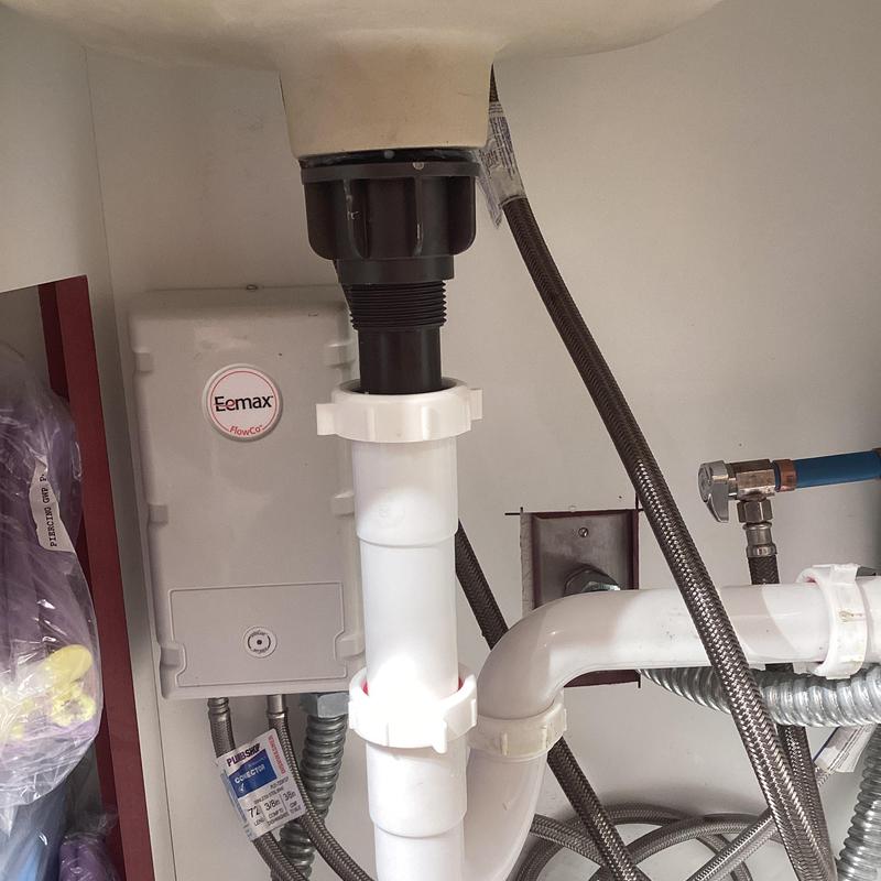 Pop-up drain assembly with slip extension and washer replacement