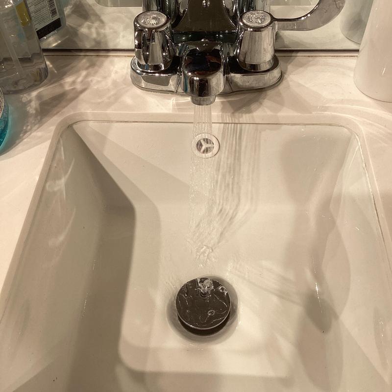 Pop-up drain and faucet with running water